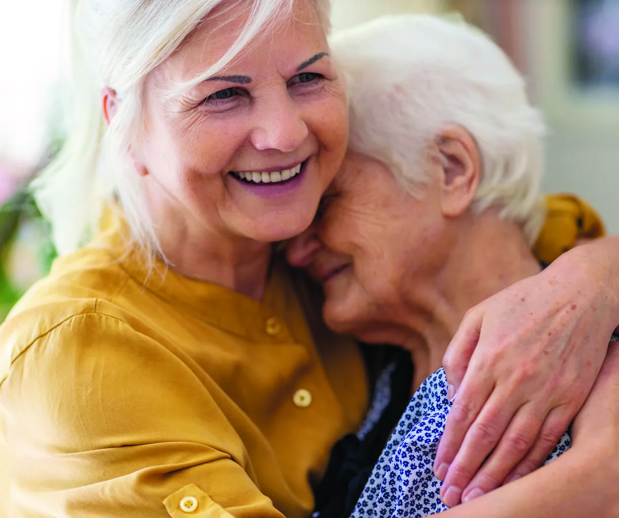 Woman spending time with her elderly mother