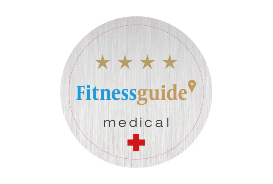 Rundes Emblem mit vier goldenen Sternen, dem Schriftzug 