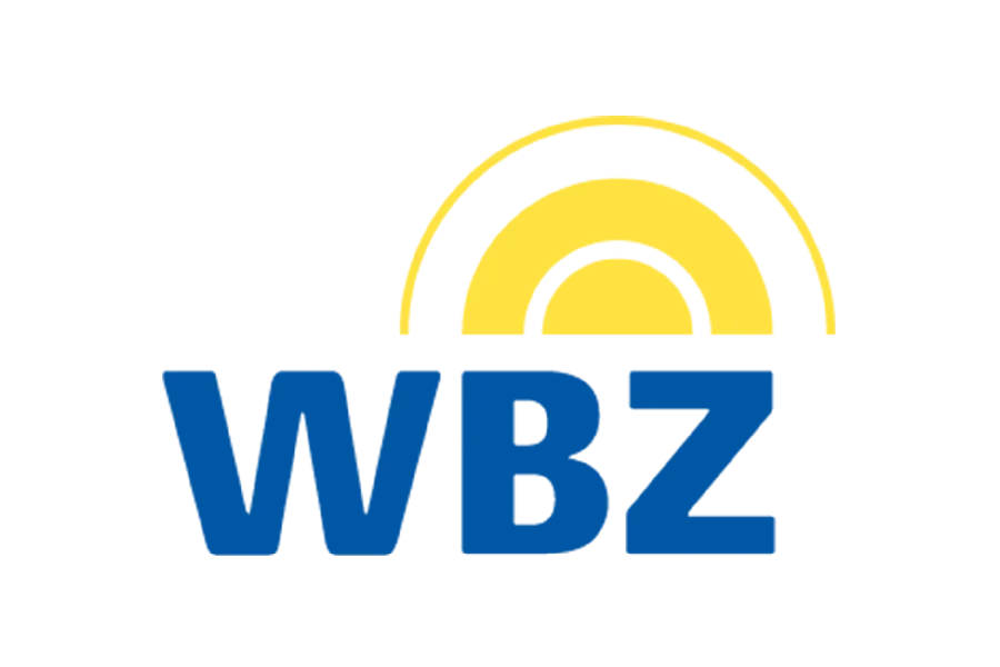 WBZ-Logo in blauer Schrift mit gelbem Sonnenmotiv darüber.