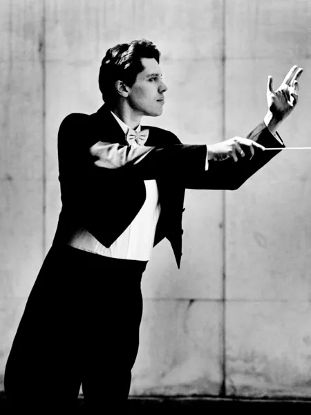 Black and white personal portrait by Michal Šebeňa, personal portraitist. Analogue B&W photography, developed from black and white film. 
Black and white personal portrait of swiss conductor Kevin Griffiths made with the analogue Hasselblad camera. Kev...